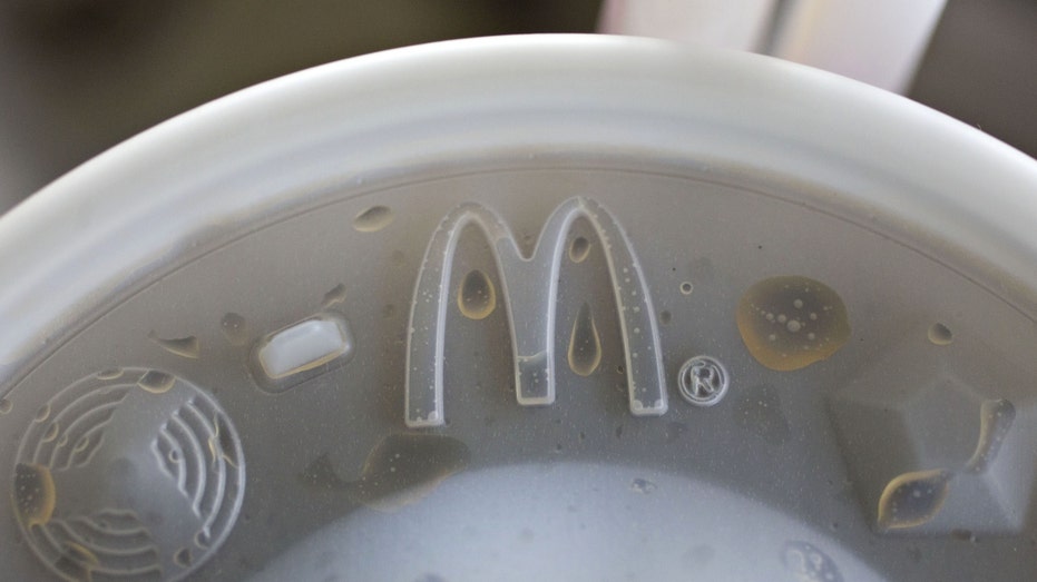 The McDonald's Corp. logo is seen on a beverage lid