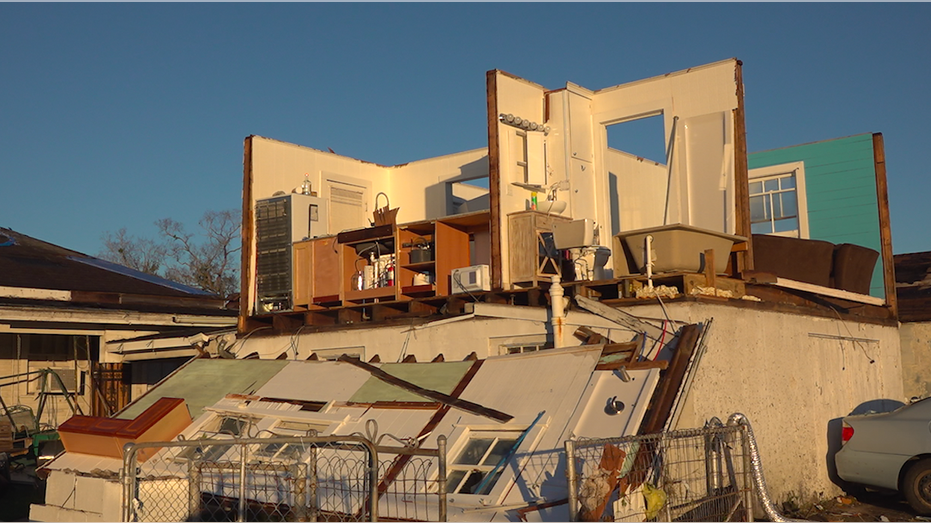 Two-story home damaged by a tornado