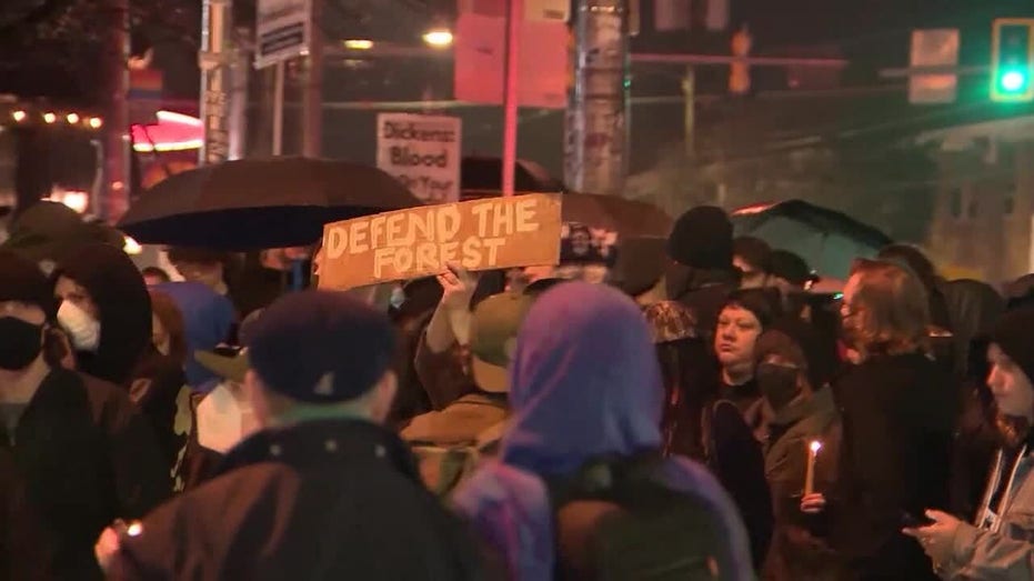 Protesters march in opposition to planned police training facility in Atlanta, Georgia