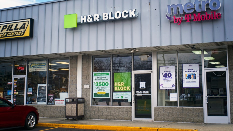 H&R Block store exterior in shopping plaza