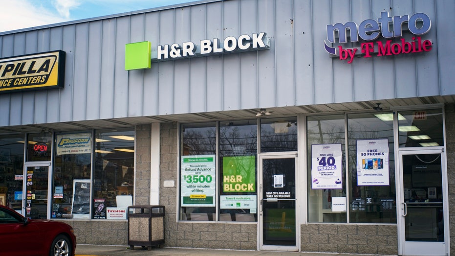 H&R Block store exterior in shopping plaza