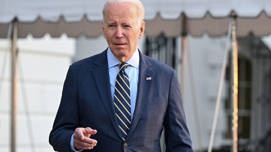 US President Joe Biden speaks to reporters