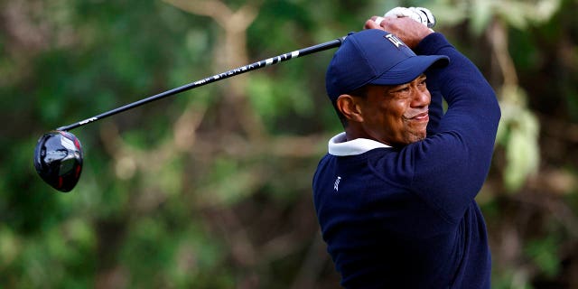 Tiger Woods plays his shot from the 12th tee during the first round of The Genesis Invitational at Riviera Country Club in Los Angeles on Feb. 16, 2023.