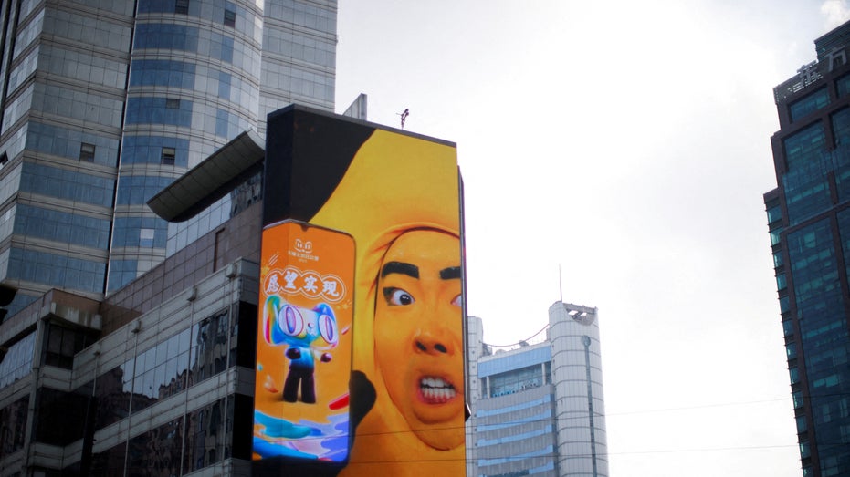 Advertisement promoting Alibaba's Singles Day shopping festival on a building