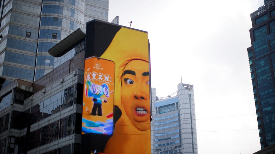Advertisement promoting Alibaba's Singles Day shopping festival on a building