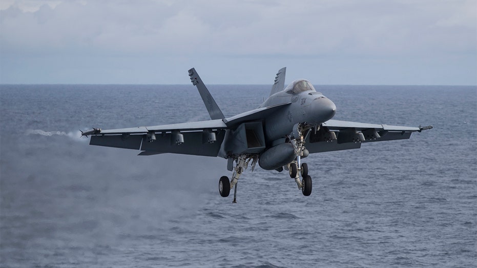 McDonnell Douglas F/A-18 Hornet lands on USS George H.W. Bush in UK