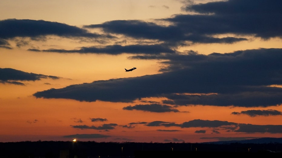 An airplane takes off at Dulles International Airport