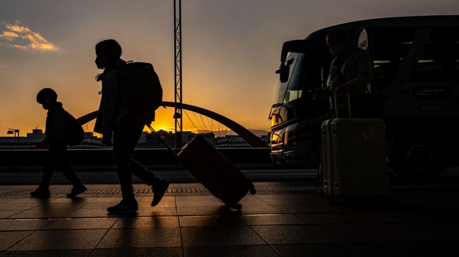 Passengers walking in airport
