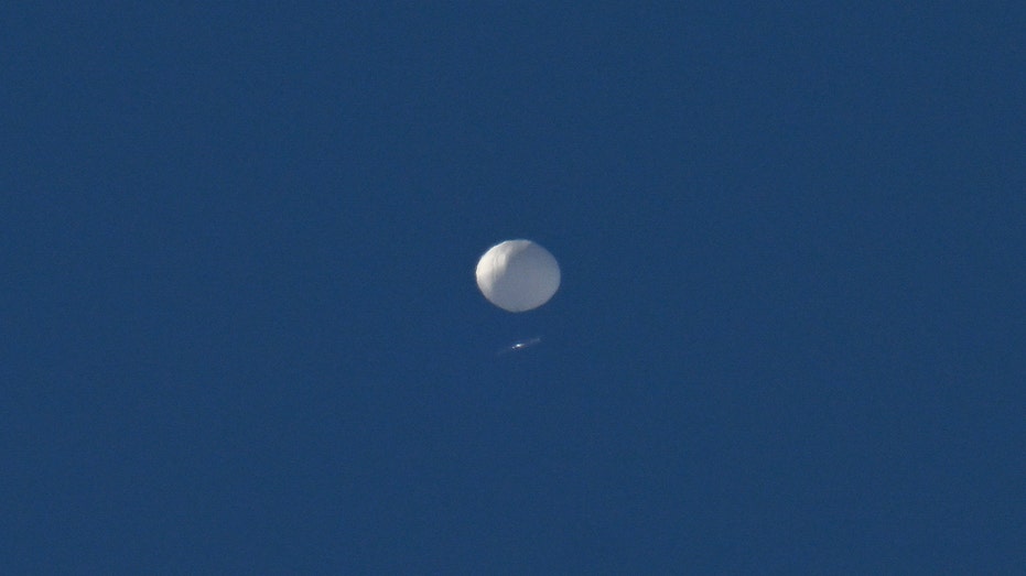 Chinese spy balloon in day sky