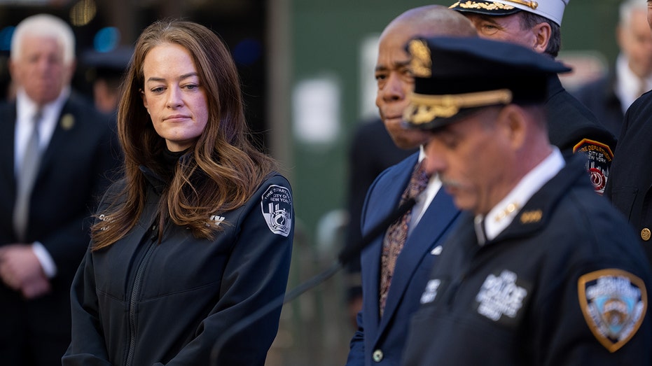 FDNY commissioner stands next to New York City mayor Adams