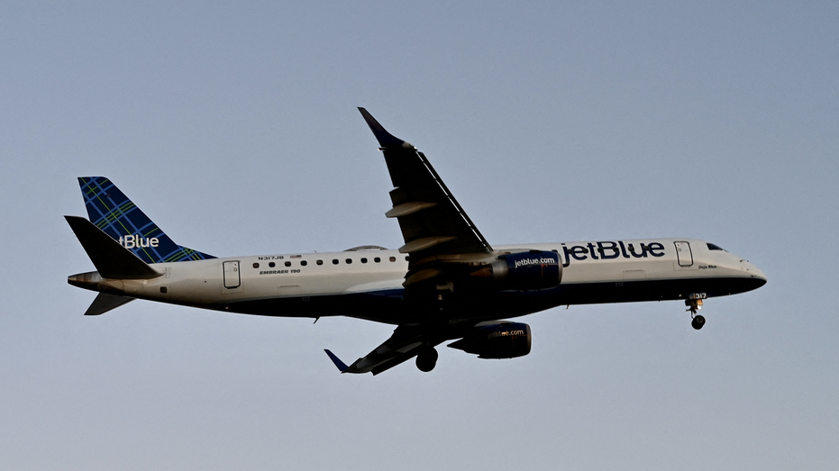 JetBlue Embraer 190 plane flying