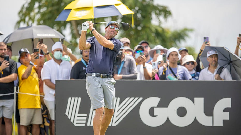 Phil Mickelson tees off