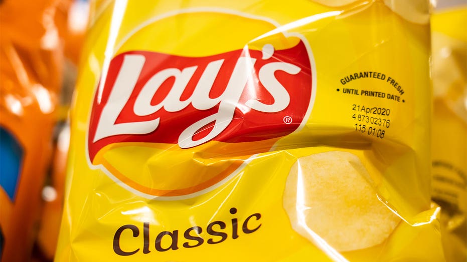Photo of a container of Lay's Classic chips.