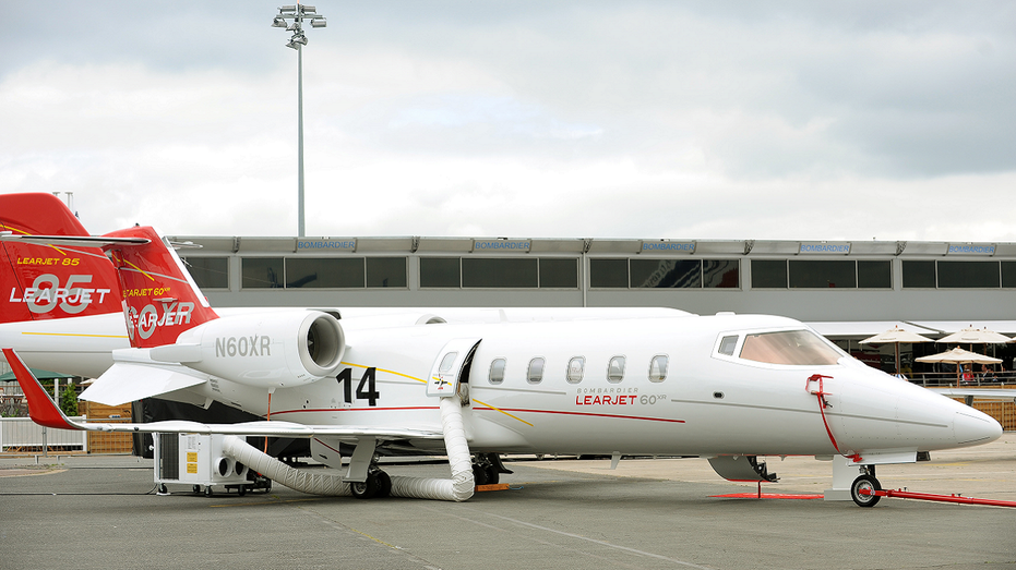 Learjet 60XR pitchy parked connected tarmac