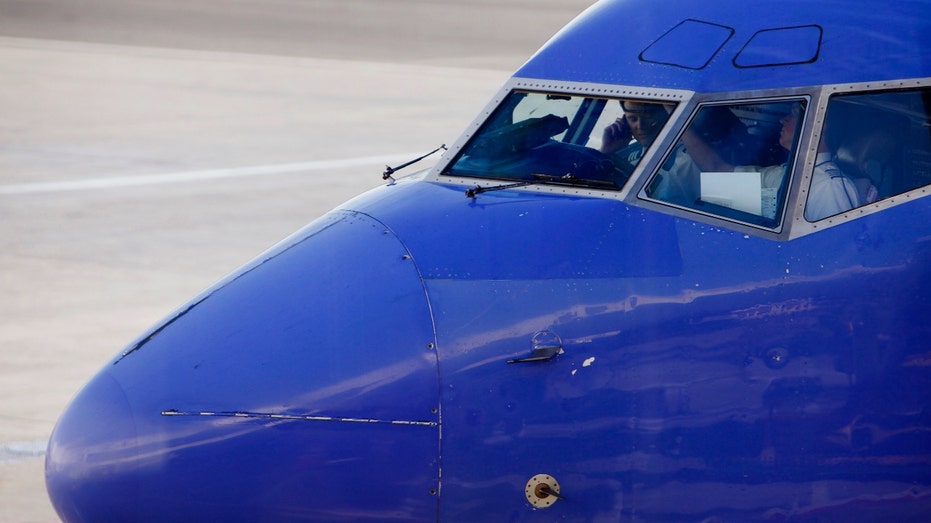 Southwest Airlines pilots in a cockpit