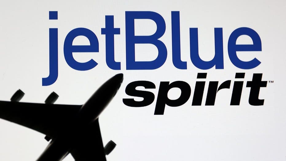 Jet Blue and Spirit logos and aircraft model
