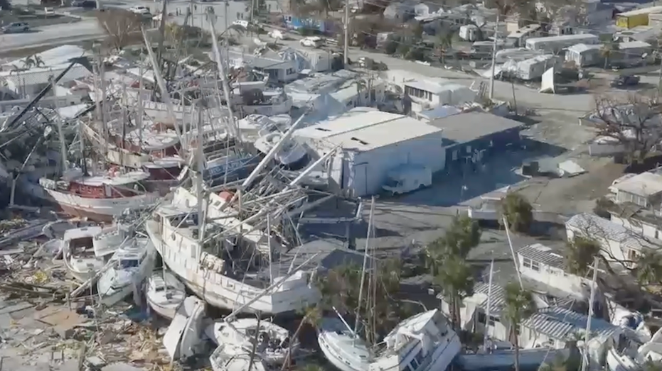 Drone video captures images of boats stacked on top of each other