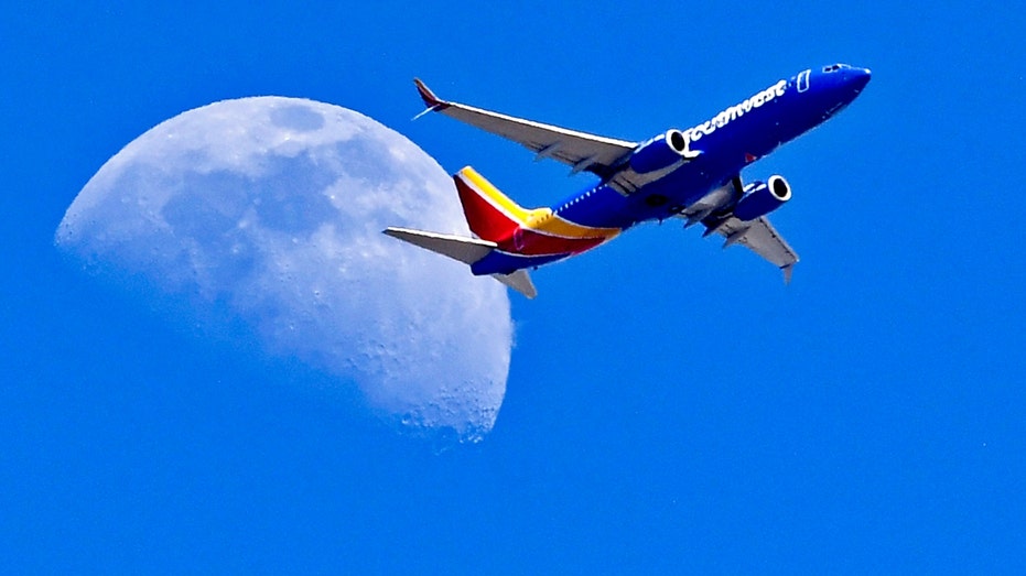 A Southwest Airlines plane and the moon