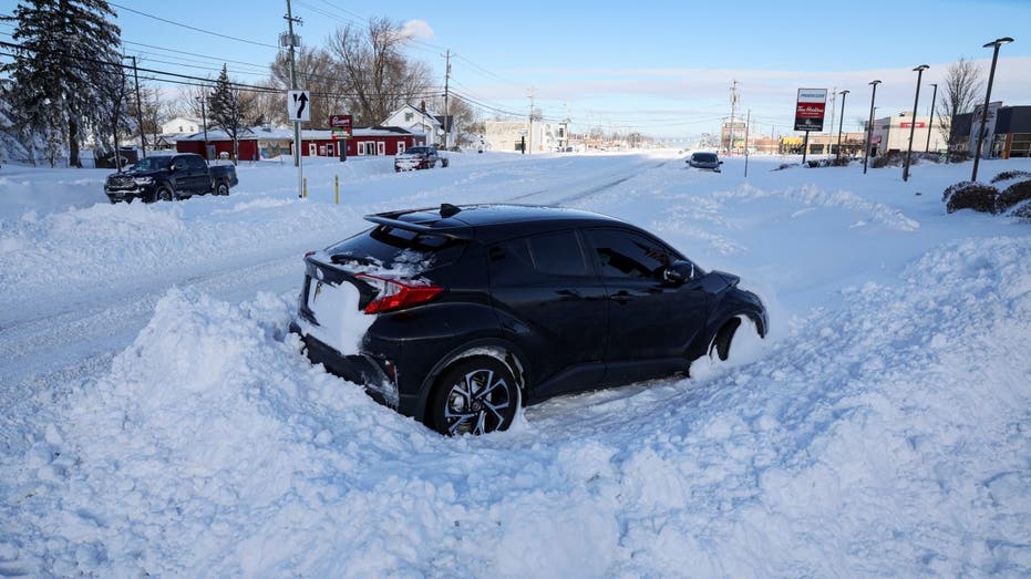 Stranded Vehicle stuck in snowbank