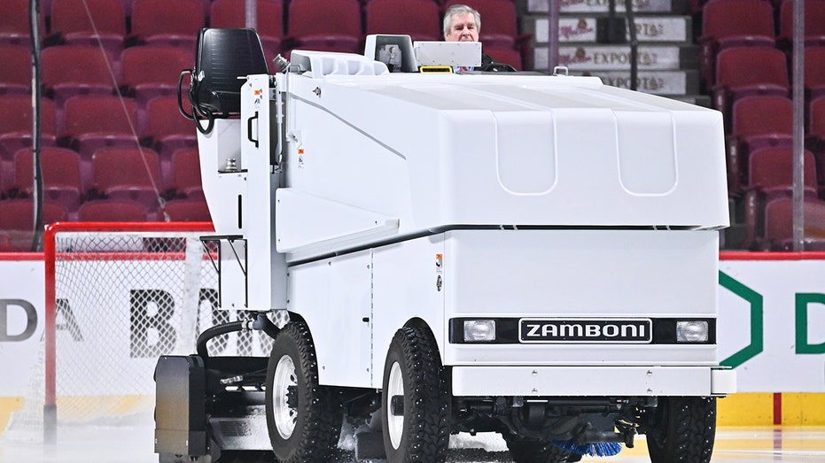 Zamboni resurfacing ice 