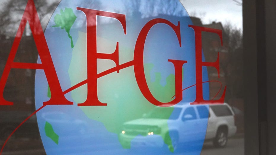 A sign is painted on the window of the American Federation of Government Employees offices on January 20, 2023 in Chicago, Illinois.