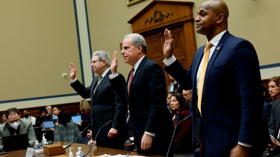 U.S. Comptroller General Gene Dodaro, Michael Horowitz, chair of the Pandemic Response Accountability Committee, and David Smith, assistant director of the U.S. Secret Service's Office of Investigations, are sworn in during a House Oversight and Reform Committee hearing in the Rayburn House Office Building on February 01, 2023 in Washington, DC