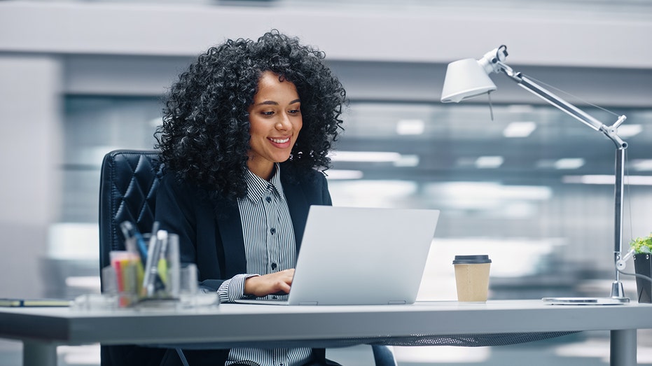 woman working on office computer