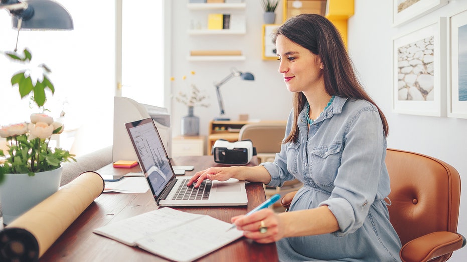 pregnant woman working from home