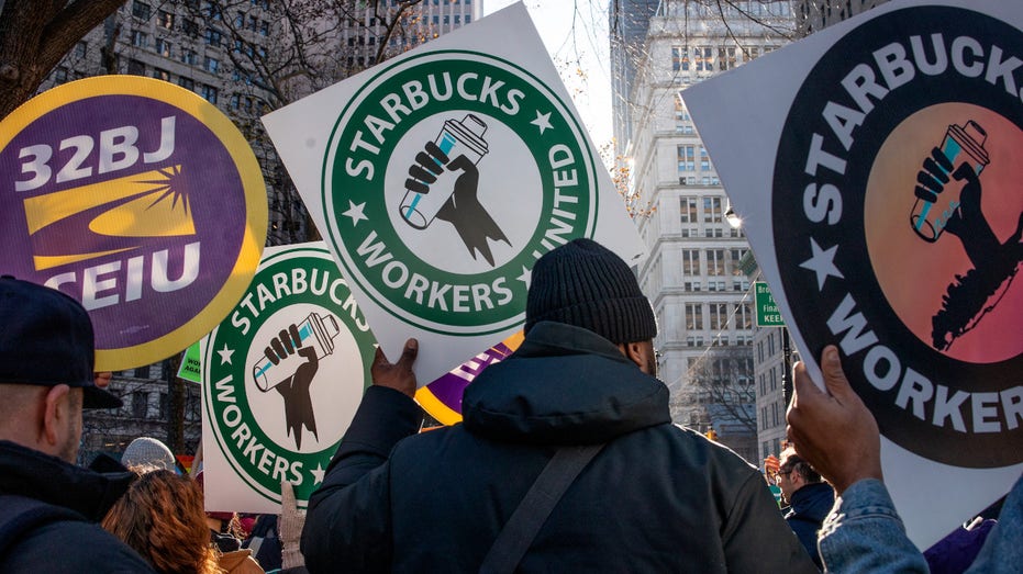 Starbucks workers hold a rally to unionize