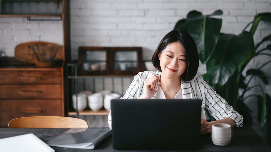 woman working on computer from home