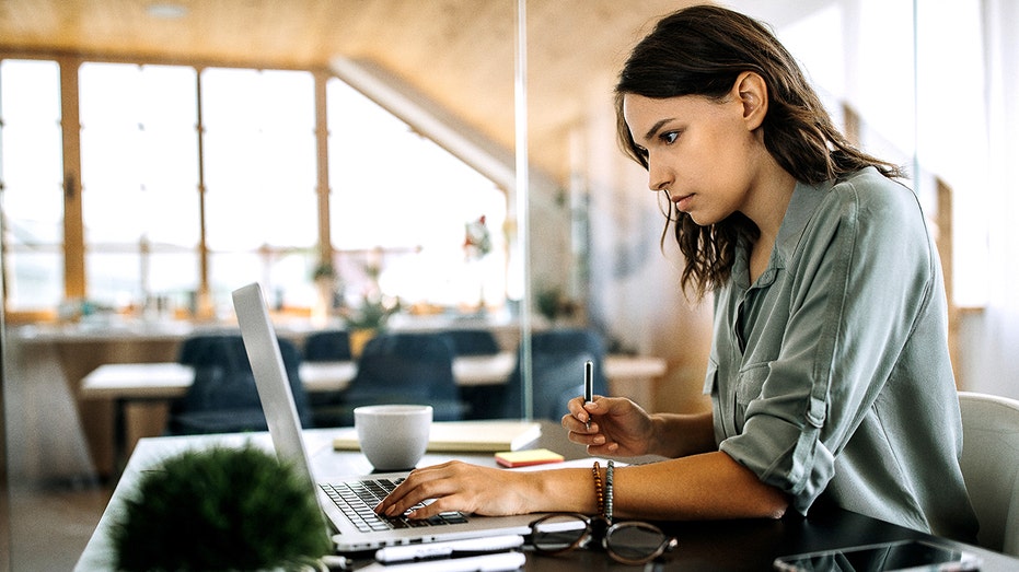 woman working on computer in office