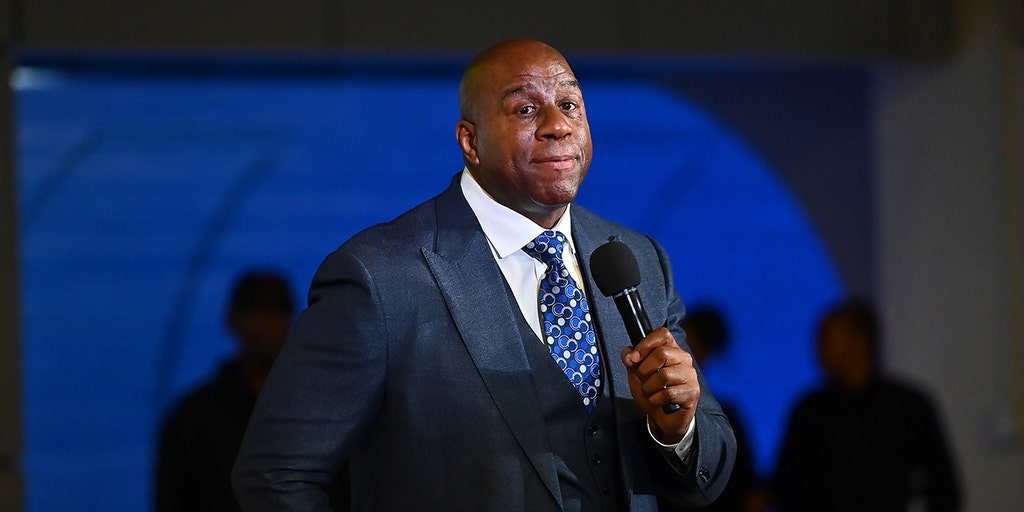 Magic Johnson joins Josh Harris's group for Commanders bid: reports