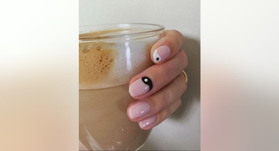 Yin and Yang manicure design