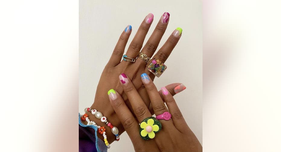 Colorful manicure with a unique design on each nail