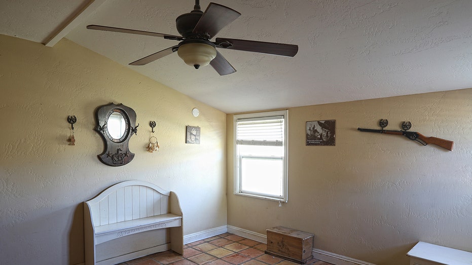 A photo of John Wayne's bedroom from his ranch in California.