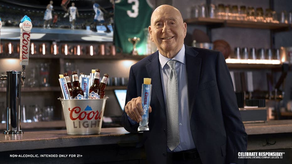 Dick Vitale with Coors Light Coorsicle