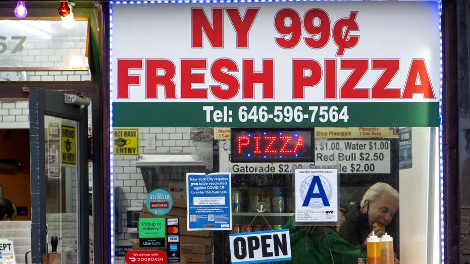 99-cent pizza store sign