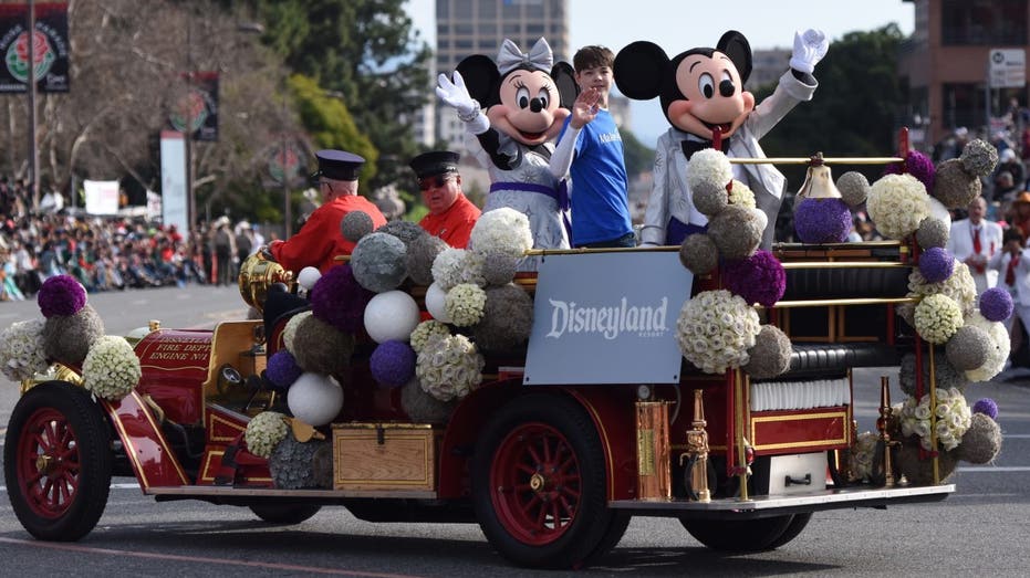 Disneyland parade with Mickey Mouse and other characters