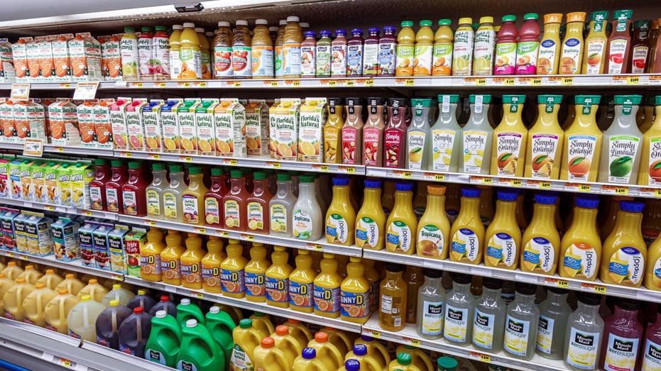 refrigerated juice shelves at grocery