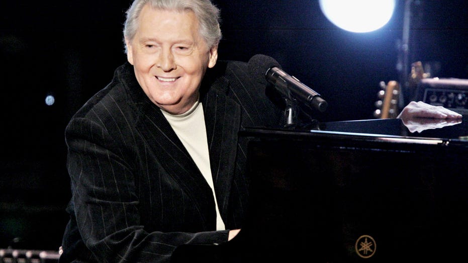 Late Jerry Lee Lewis performing on piano