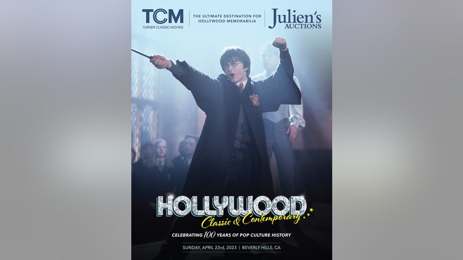 A cover of Juliens Auctions latest catalog featuring Daniel Radfcliffe as Harry Potter holding a wand