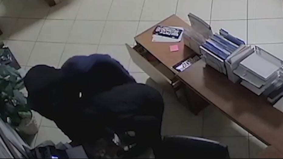 thieves rifling through dealership desk