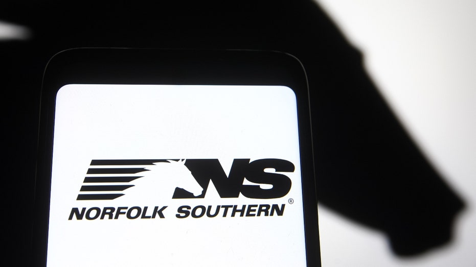 The Norfolk Southern logo on a phone screen