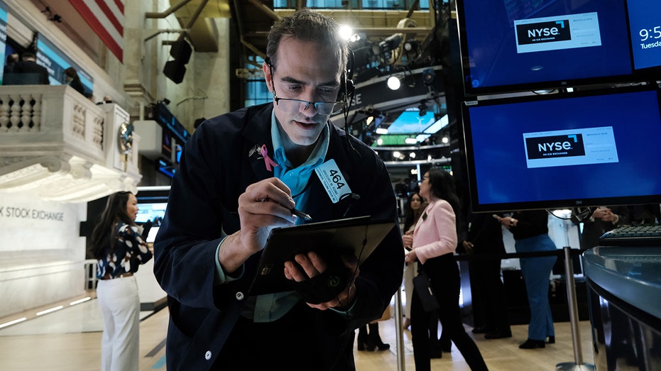 NYSE trader on Wall Street fllor