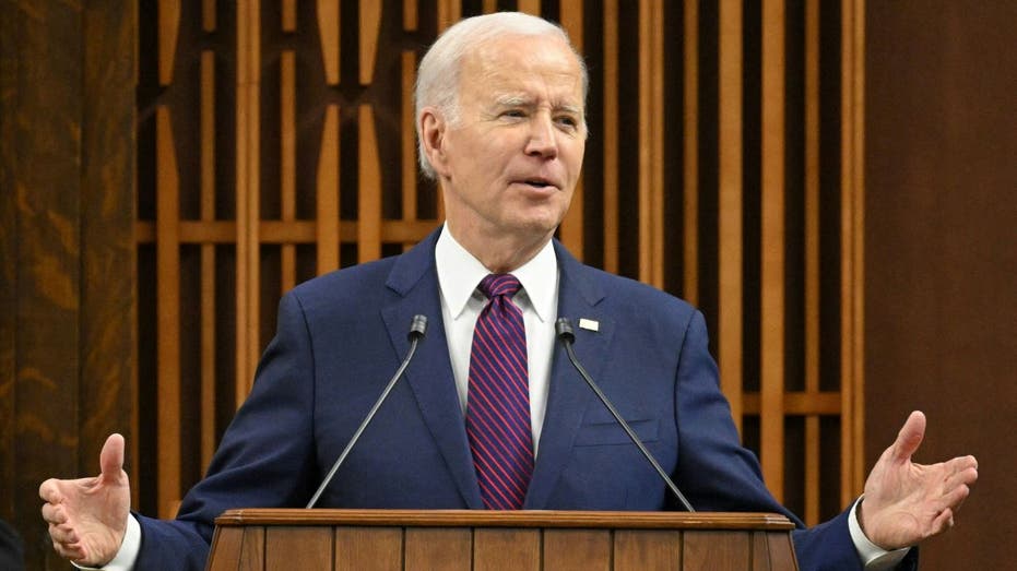 Biden speaking at podium