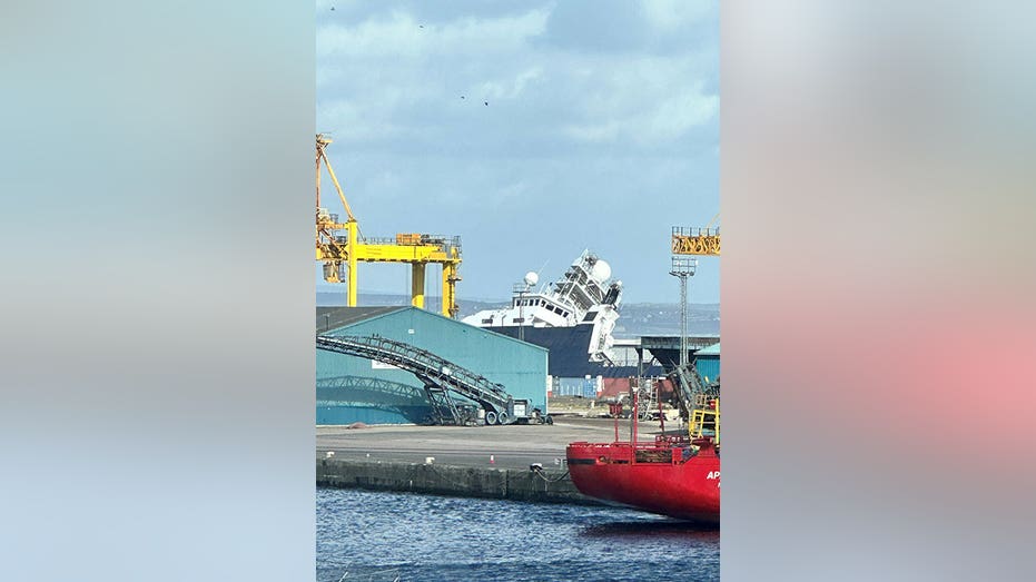 Ship tips over in Edinburgh dock