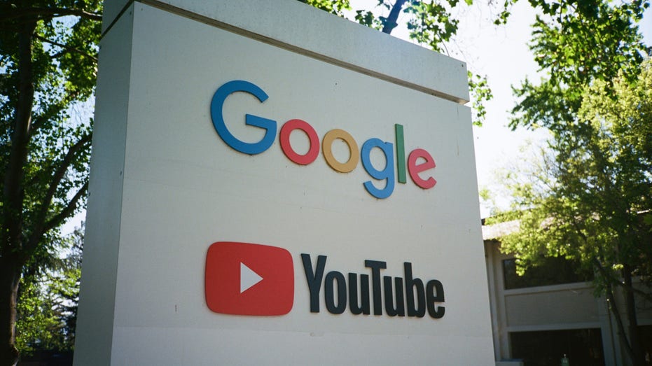 Sign with logos for Google and the Google owned video streaming service YouTube at the Googleplex