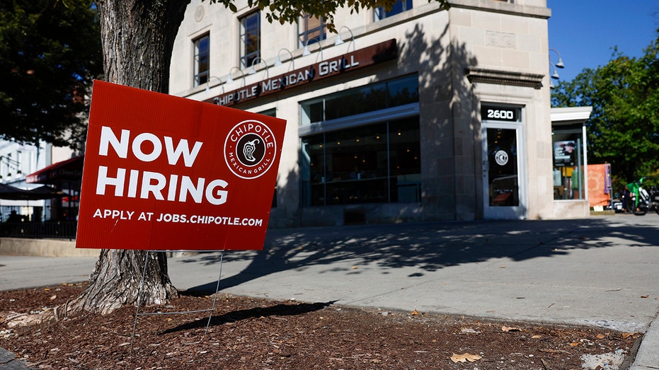 "Now Hiring" sign