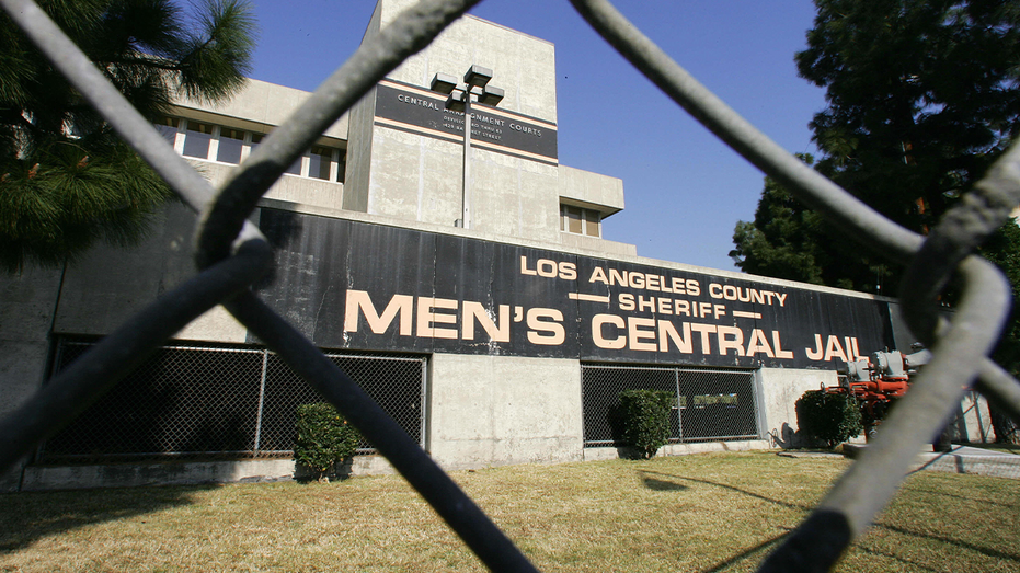 LA Men's Central Jail seen through chain link fence