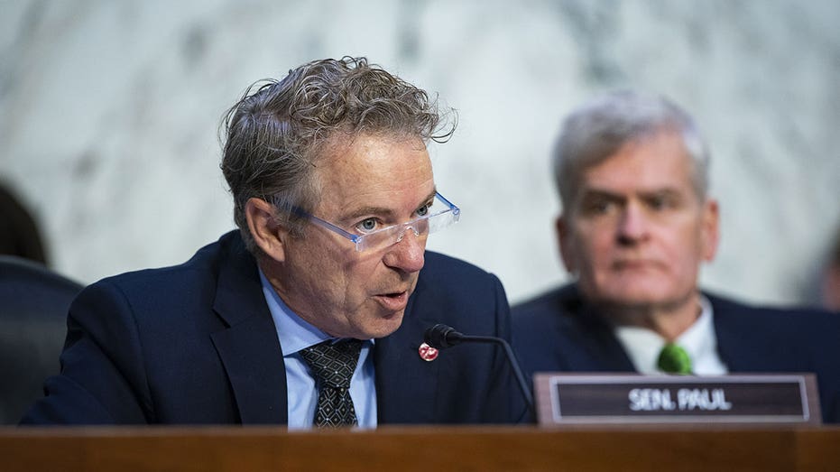Rand Paul speaks from the bench during Senate hearing